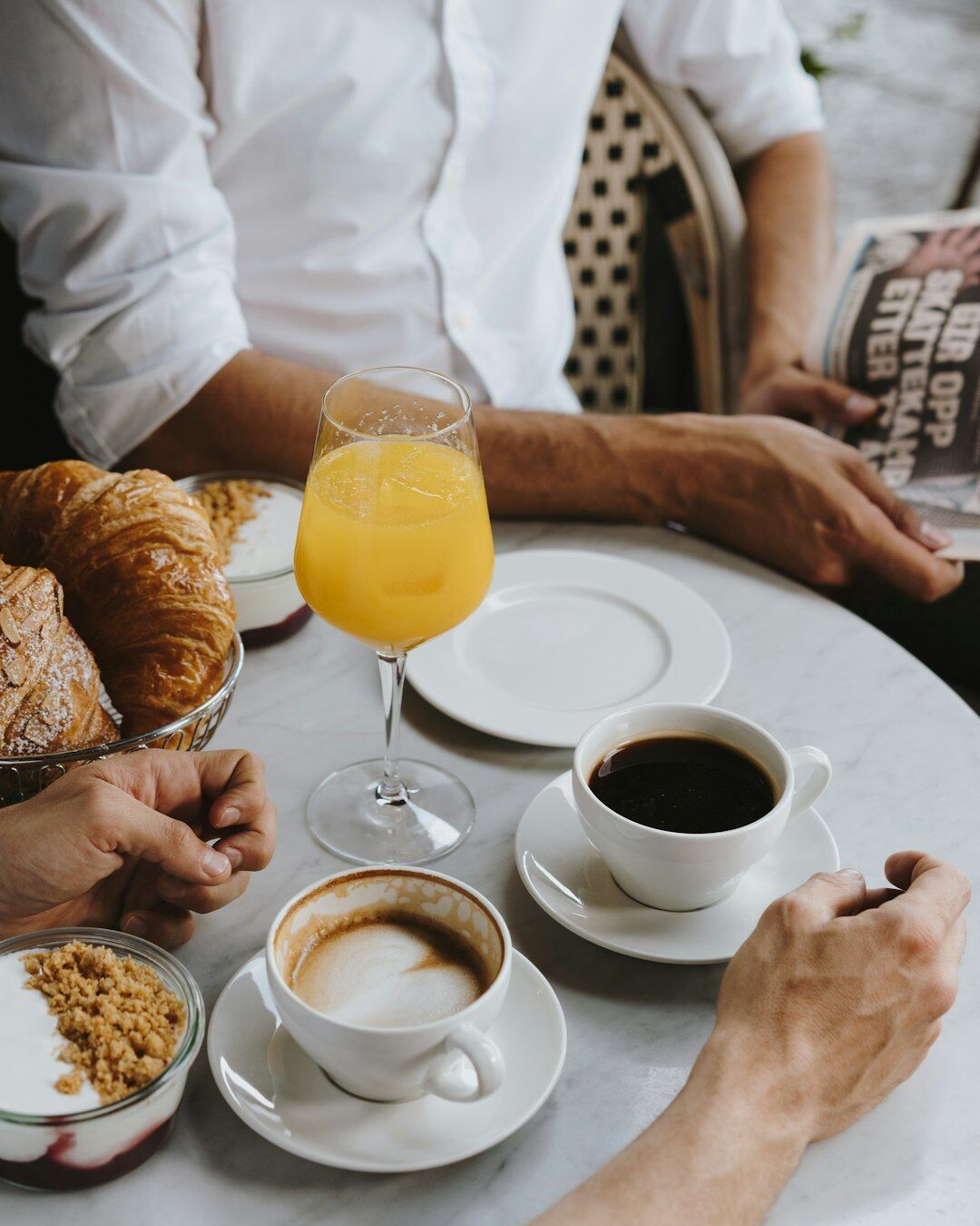 Business professionals having breakfast meeting
